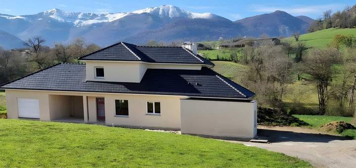 Application d'enduit sur bâtiment neuf, Pau